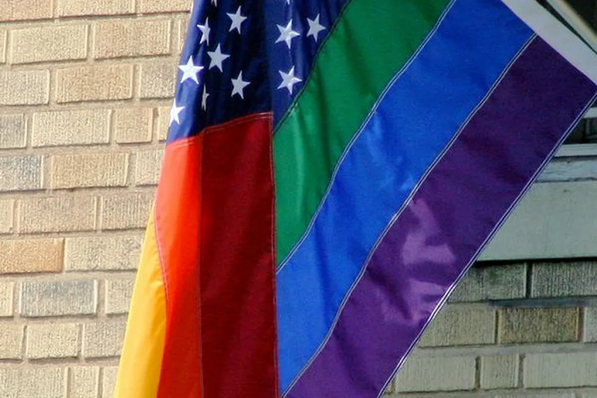 Rainbow Pride flags lining a street during Oslo Pride in Oslo
