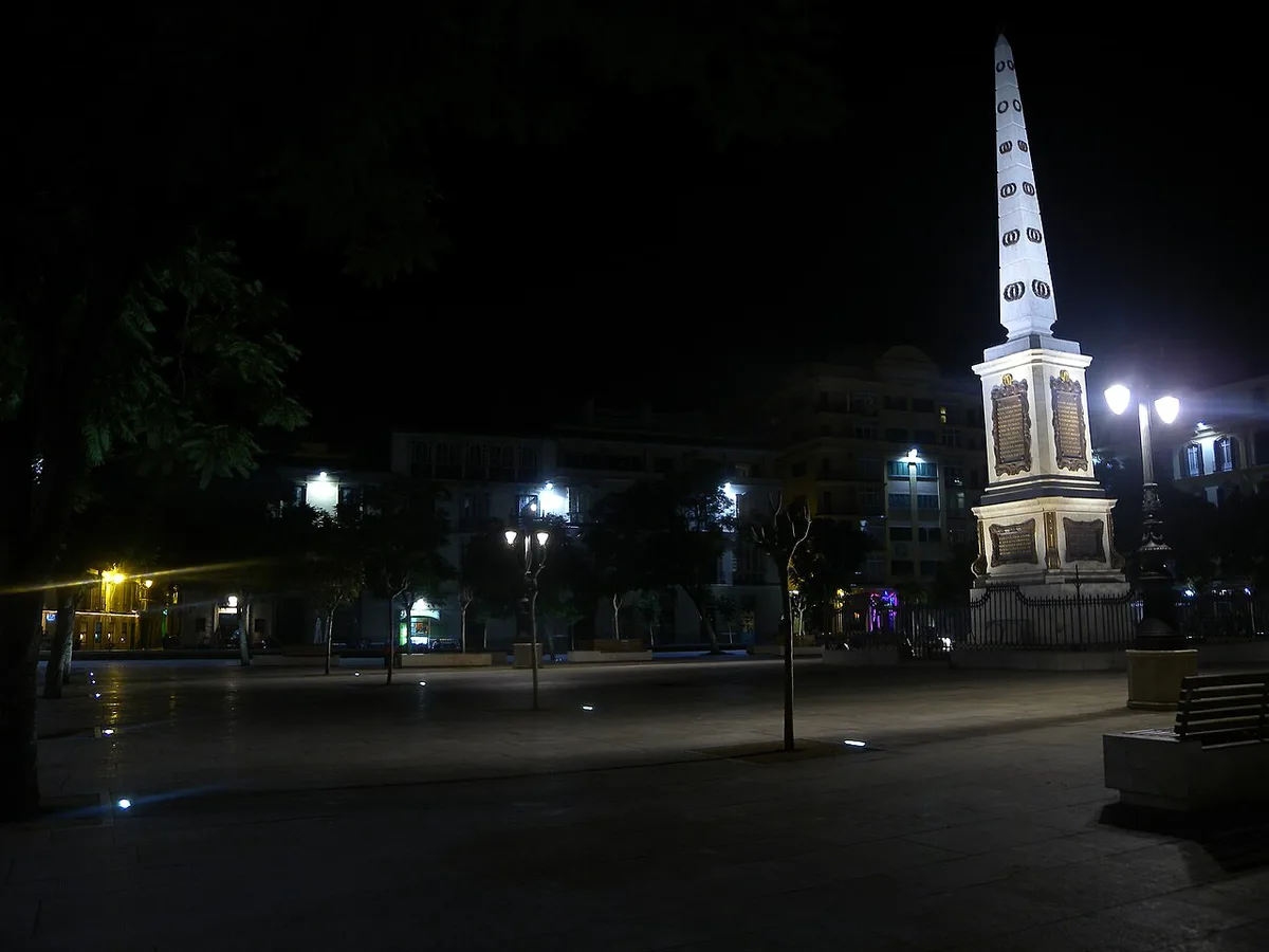 Outdoor terrace bars around Plaza de la Merced in Malaga's historic center at night — 1